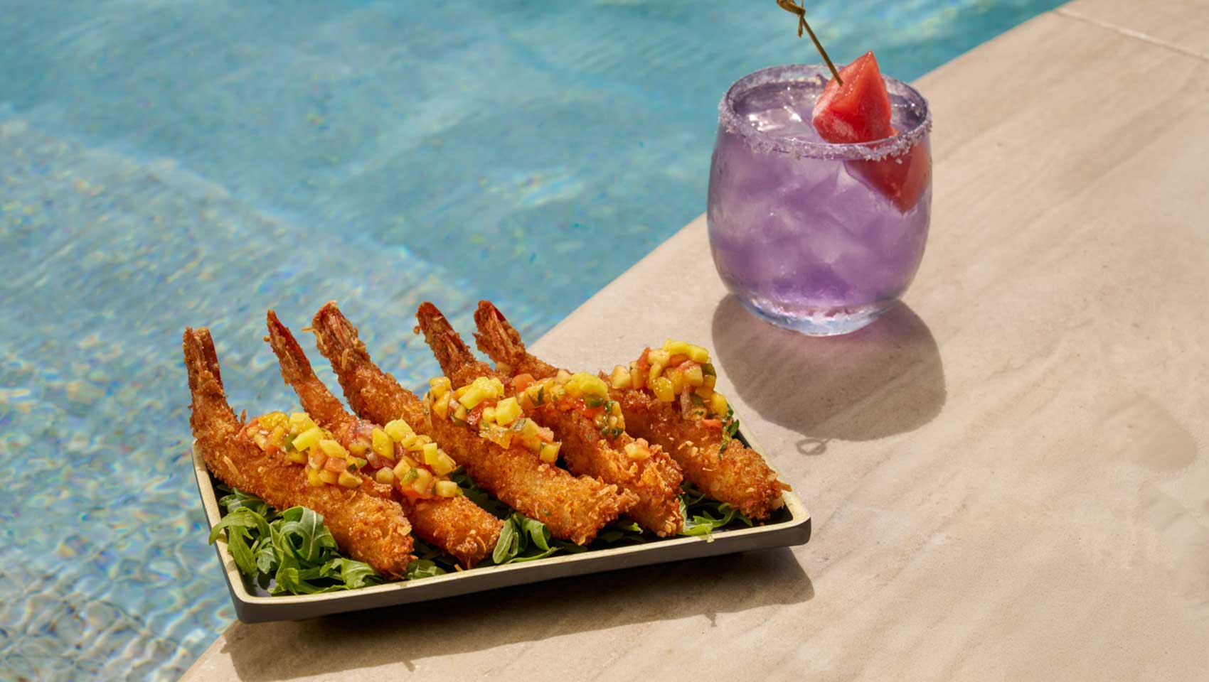 Cocktail and shrimp by the pool at Nana Cabana Grand Cayman